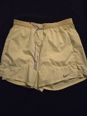 Nike Women's Light Yellow Running Shorts with Drawcord